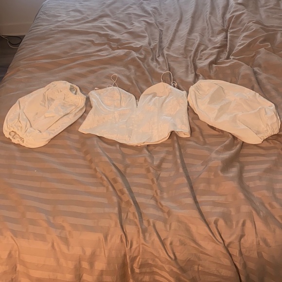 Like new condition Celeste Moire Top in Blanc
For Love & Lemons
Color:Blanc - Picture 2 of 11